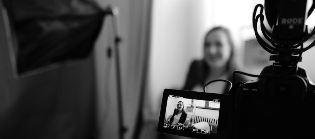 A women being interviewed on video 